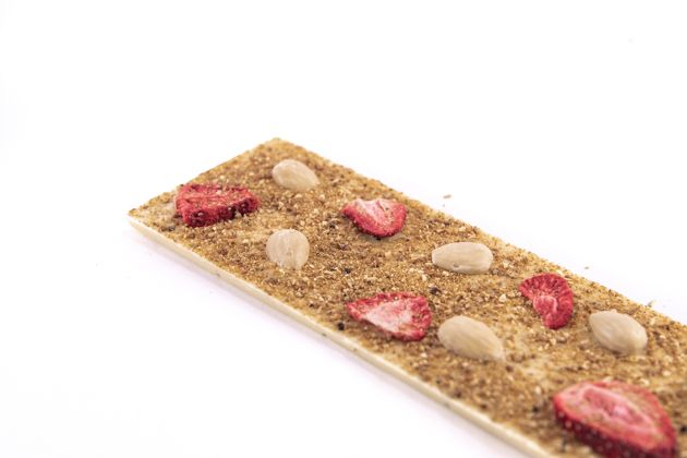 White chocolate with strawberry, orange and almonds