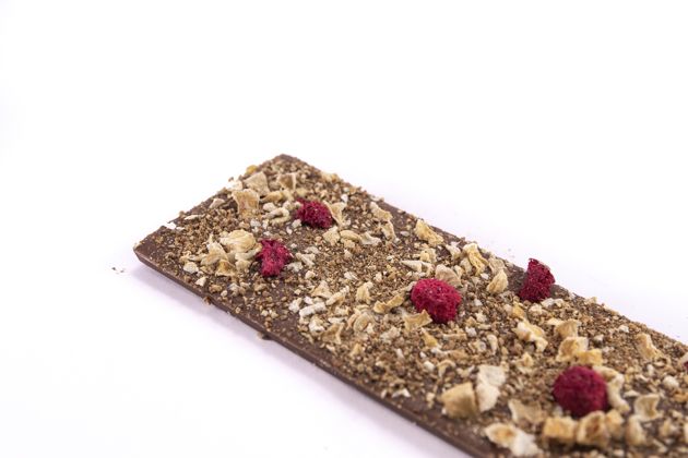 Milk chocolate with raspberry, peach and orange peel