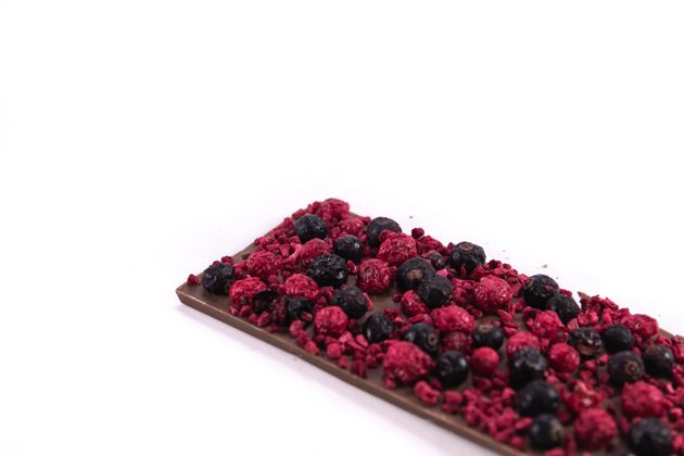 Milk chocolate with raspberries and red and black currants