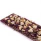 Milk chocolate with almonds, peach and rose flowers